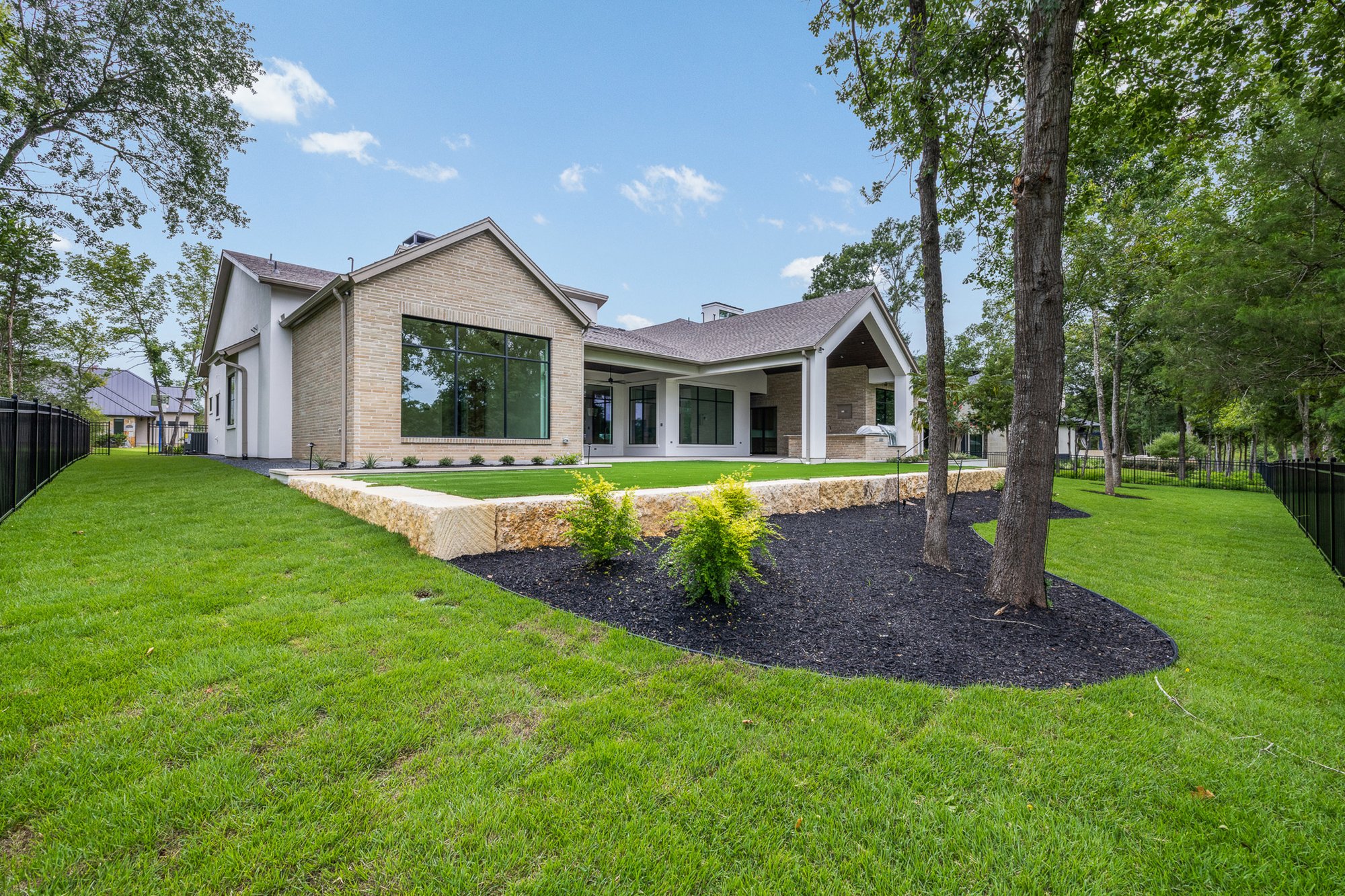 Covered outdoor living area overlooking the Traditions Club golf course