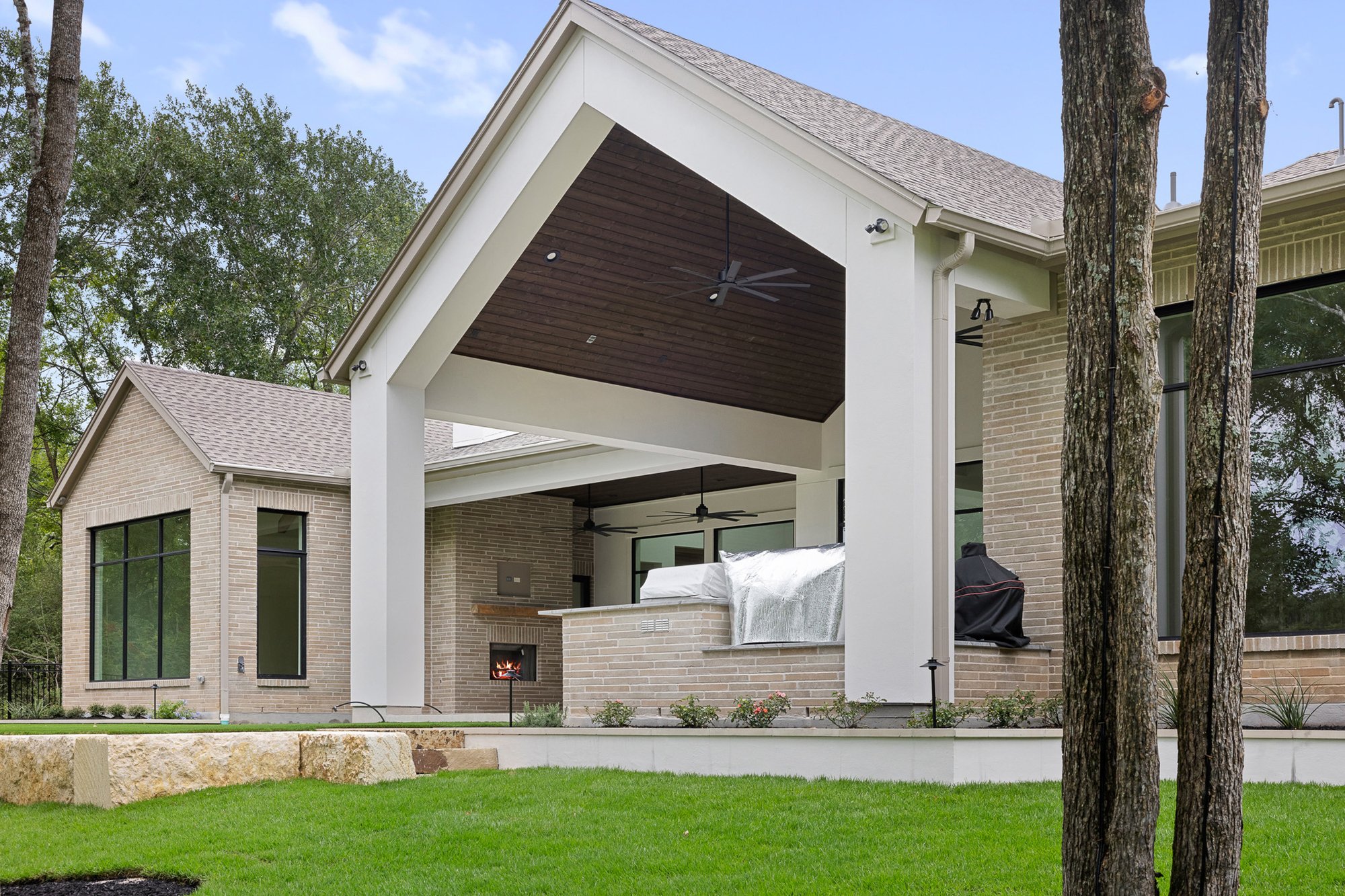 Backyard of a luxury custom home overlooking the Traditions Club golf course