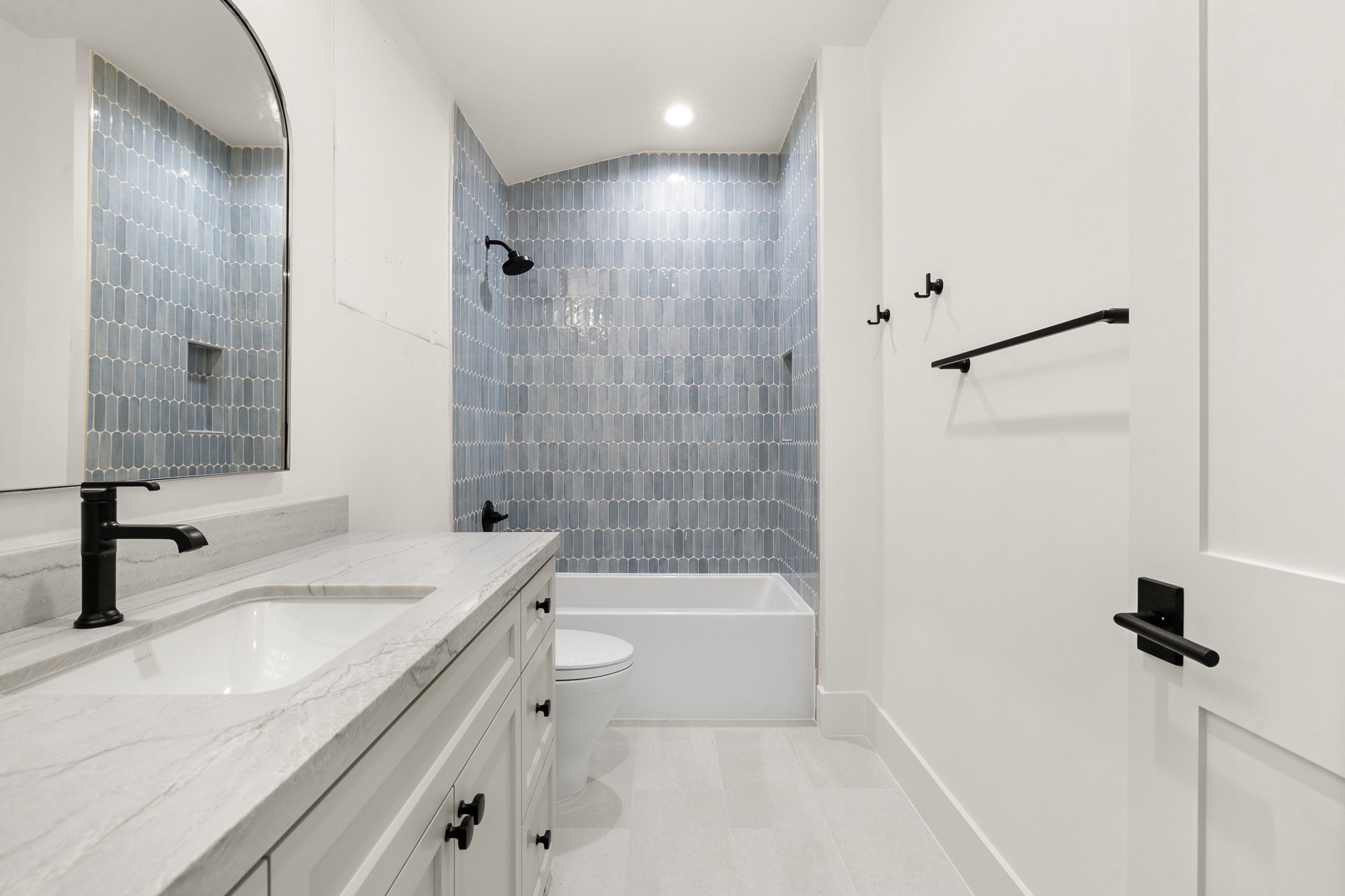 Custom bathroom featuring premium finishes and designer fixtures