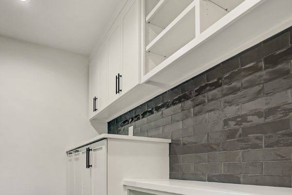 Custom Laundry Room Remodeling Black Back Splash Houston