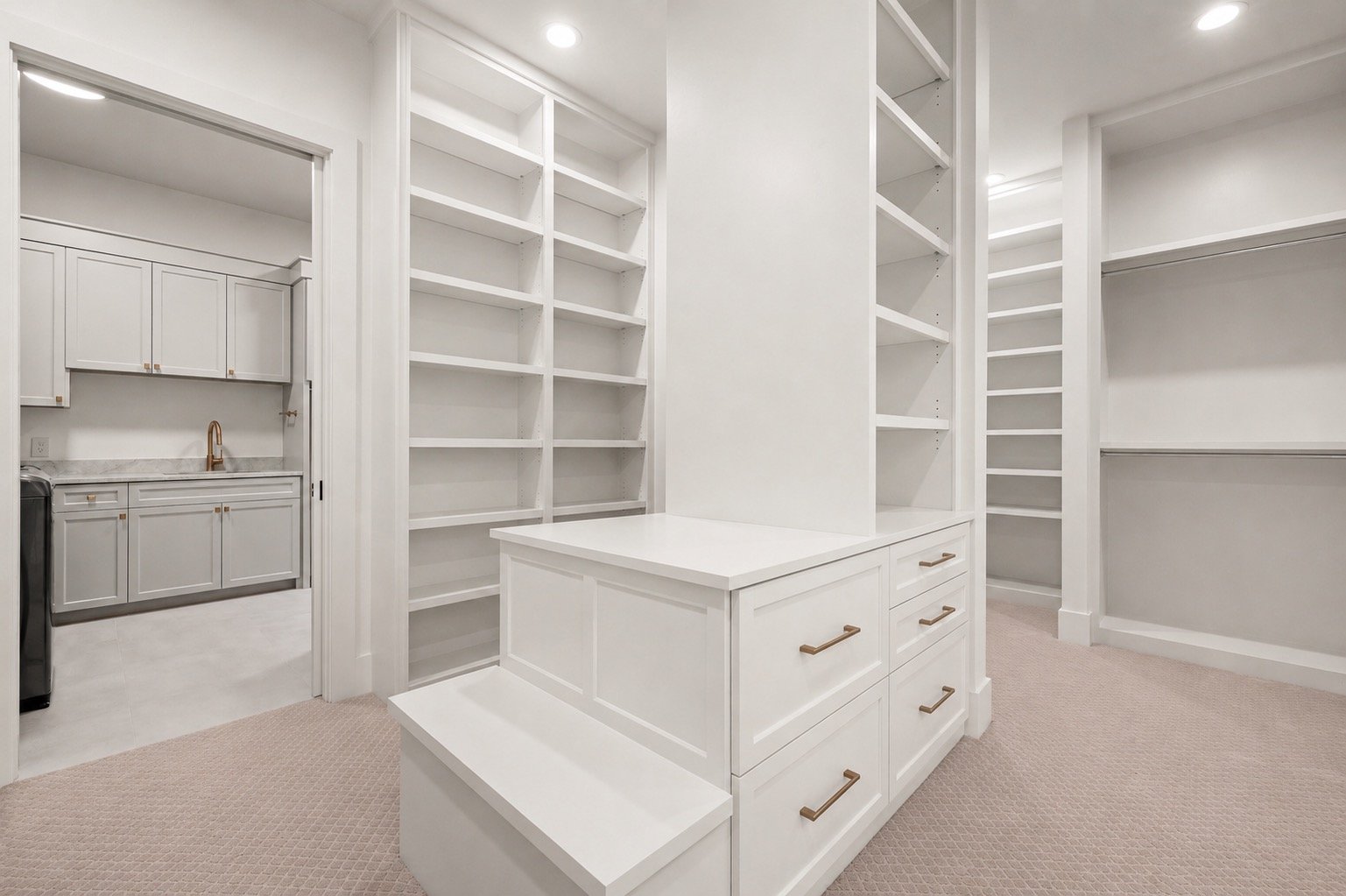 Oversized walk-in closet with custom storage and organization