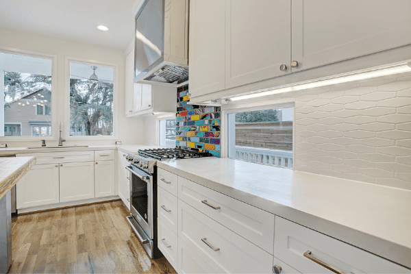 Low Windows with Custom Backsplash in a Luxury Kitchen