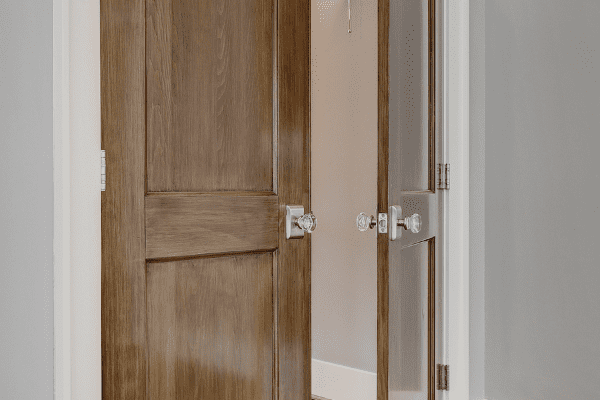 Vintage Door Knobs on Industrial Style Doors in a Houston Heights Remodel