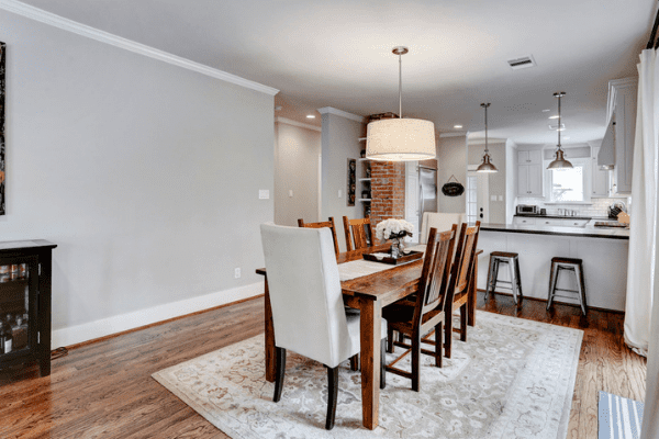 Custom Home Dining Room with a Wooden Dinner Table