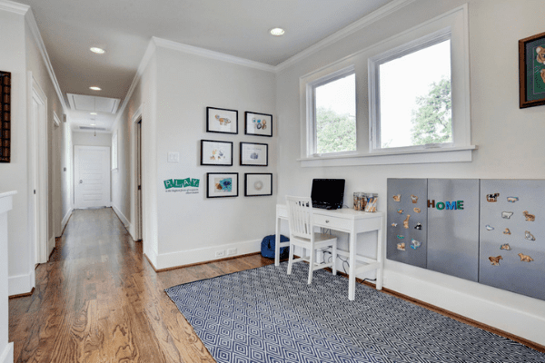 Custom Home Hallway With a White Desk and Chair