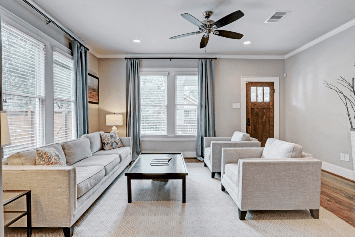 Custom Home Living Room With Several Windows and a lot of Natural Light