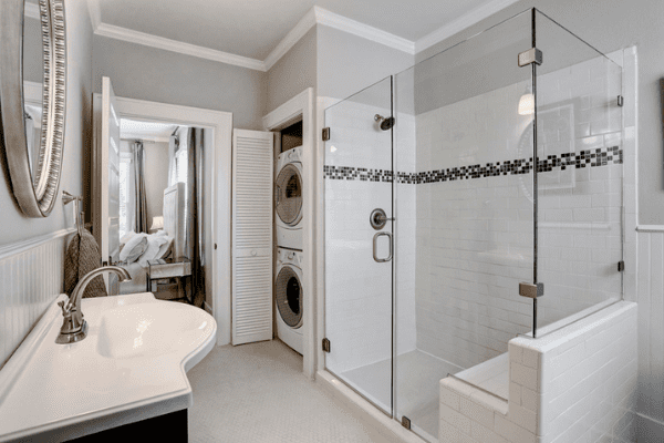 Custom Luxury Home Bathroom in Houston with a Glass Walk-in Shower and a Single Sink