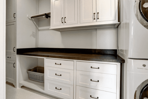 Custom Storage Space Next to a Washer and Dryer for Quick Access