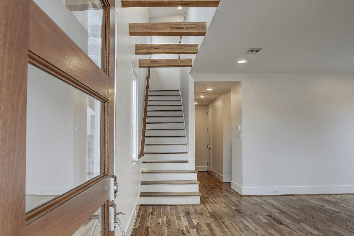 Luxury Home Build Entry Way with Exposed Beams