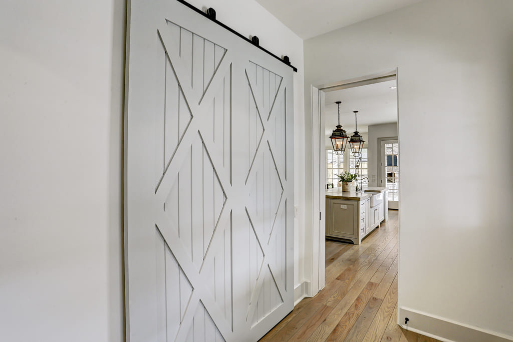 Sliding barn door in custom luxury home in Houston