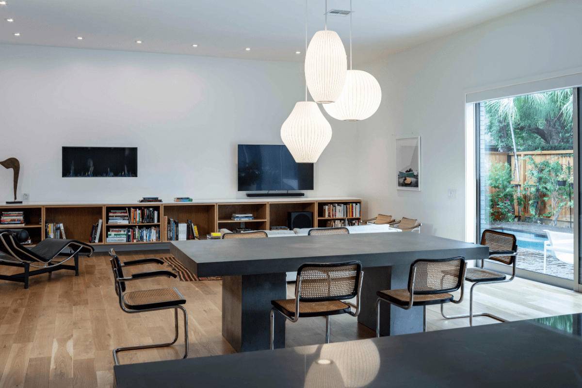 Interior of Modern Home with Sleek Black Tables and Minimalist Brown Chairs